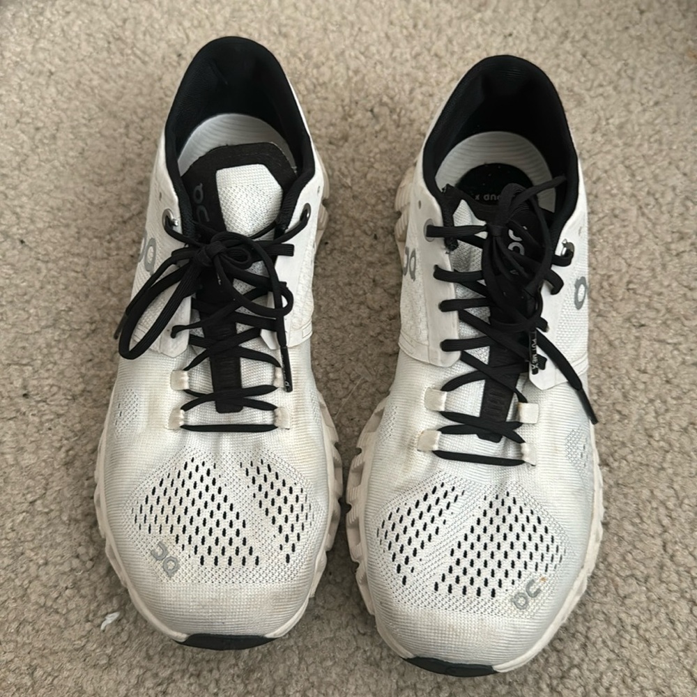 On running sneakers black and white